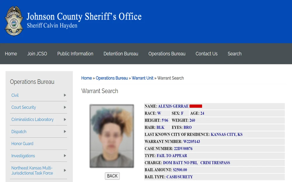 A screenshot from the Johnson County Sheriff's Office detailing a photo and personal details such as race, sex, age, height, weight, hair and eye color, city of residence, warrant and case numbers, charges, and bail information.